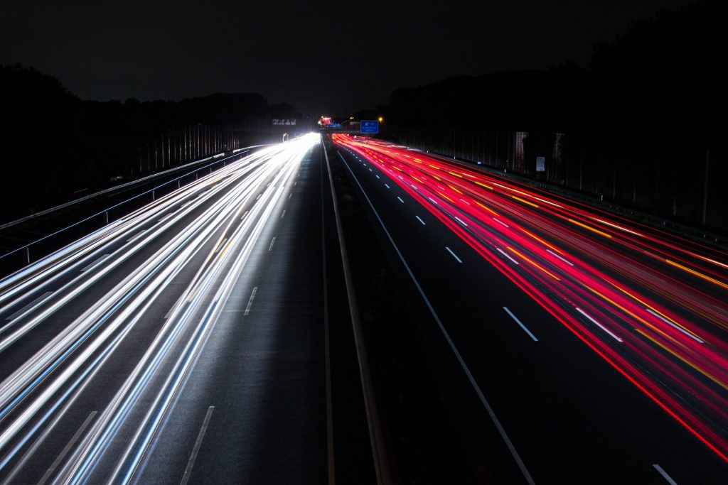 Photo by Pixabay: https://www.pexels.com/photo/action-asphalt-blur-cars-315934/